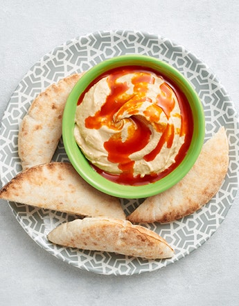 Creamy Hummus with PERi-PERi Drizzle & Pita